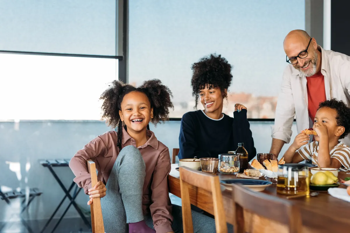 A family laughing together at home